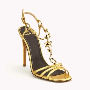 Sandales Blake en cuir doré métallisé avec scorpion et talon haut – Maison Skorpios par Adriana Abascal